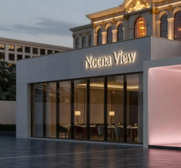 Eleganckie wejście do restauracji Nocna View w wieczornym oświetleniu